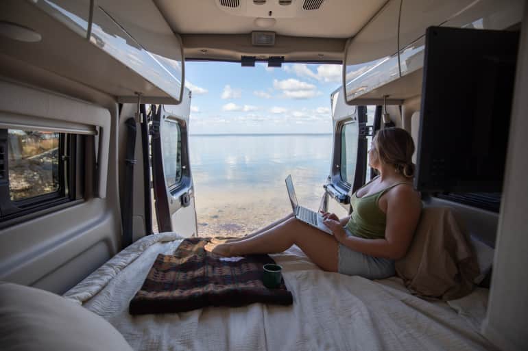 Woman watching television in a recreational vehicle